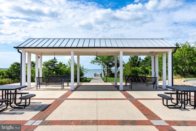 view of home's community featuring a gazebo and a water view