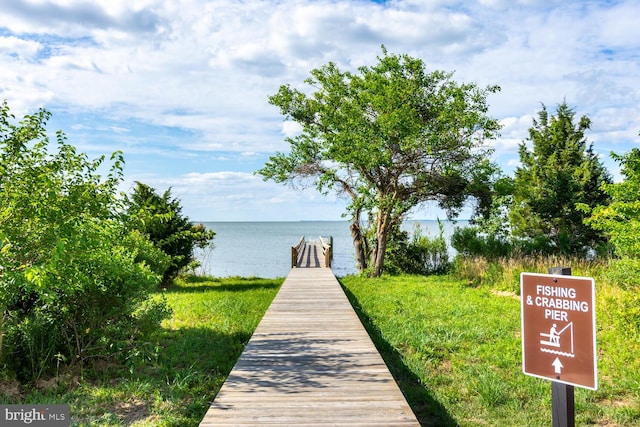 dock area featuring a water view