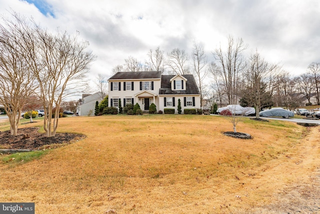 view of front of home with a front yard