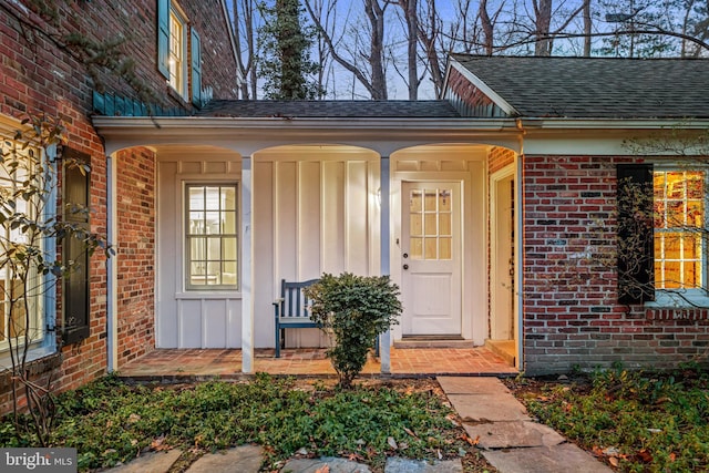 property entrance with covered porch