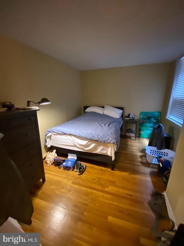 bedroom featuring hardwood / wood-style floors