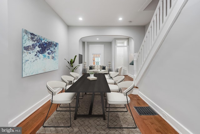 dining area featuring hardwood / wood-style floors