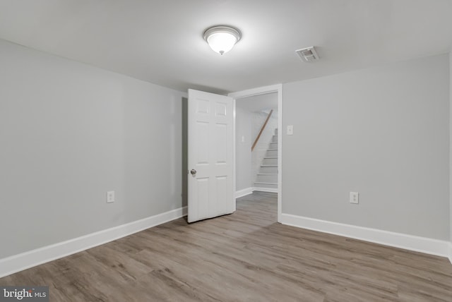 empty room with light wood-type flooring