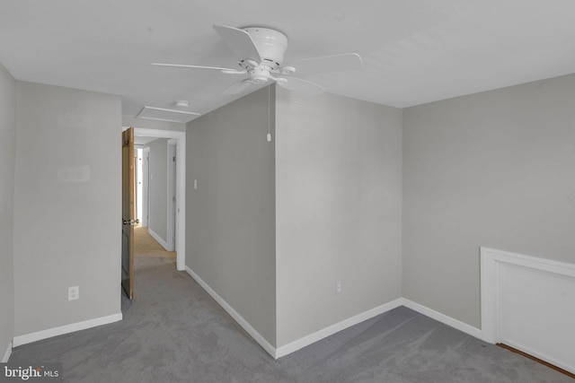 unfurnished room with carpet flooring and ceiling fan