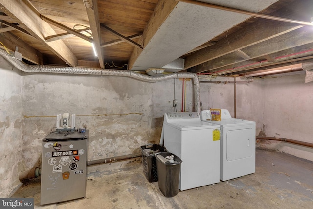 basement with separate washer and dryer