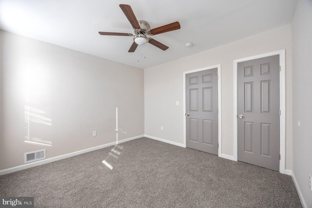 unfurnished bedroom featuring carpet flooring and ceiling fan