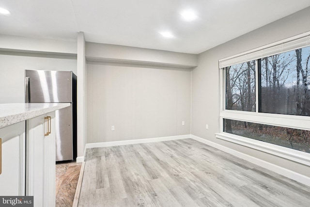 interior space with light hardwood / wood-style floors