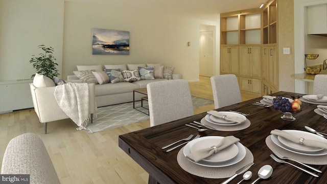 dining room with light hardwood / wood-style floors