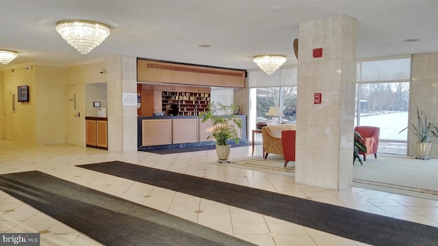 welcome area featuring an inviting chandelier