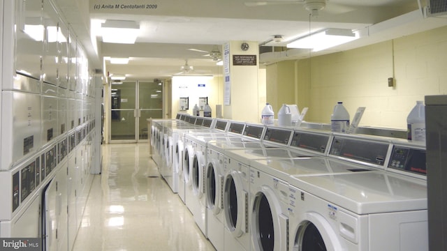 clothes washing area with ceiling fan, stacked washer and dryer, and washer and dryer