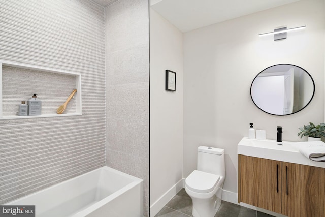 full bathroom featuring tile patterned flooring, vanity, toilet, and tiled shower / bath combo