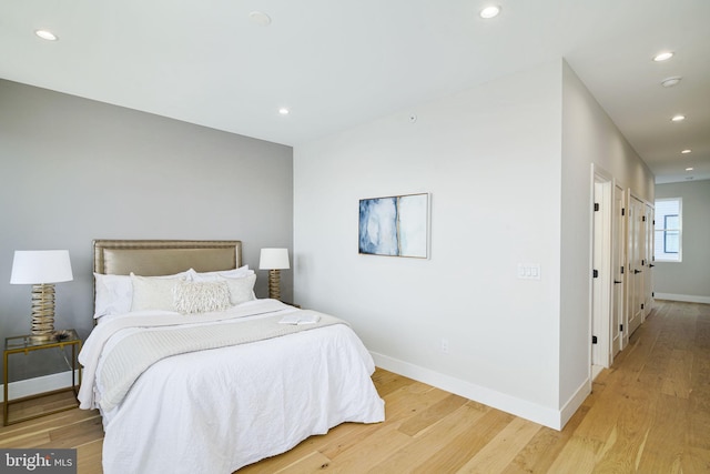 bedroom featuring light hardwood / wood-style flooring