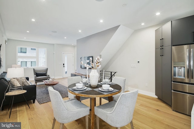 dining room with light hardwood / wood-style flooring