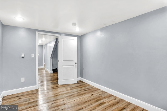 unfurnished room featuring light hardwood / wood-style floors