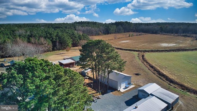 birds eye view of property with a rural view