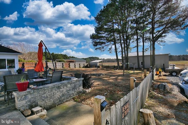 view of yard with a patio area