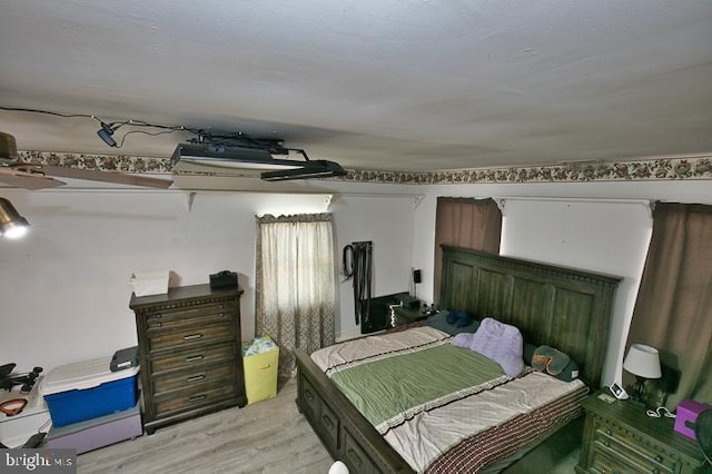 bedroom featuring light wood-type flooring