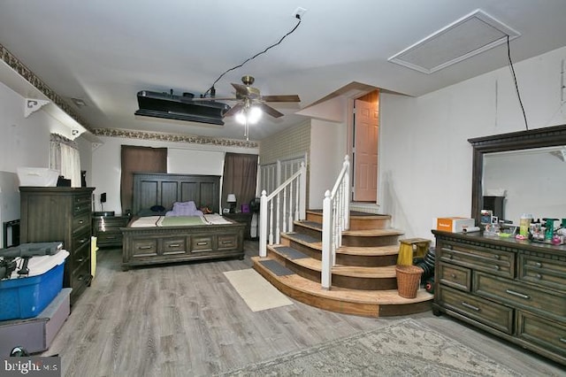 interior space with light hardwood / wood-style flooring and ceiling fan