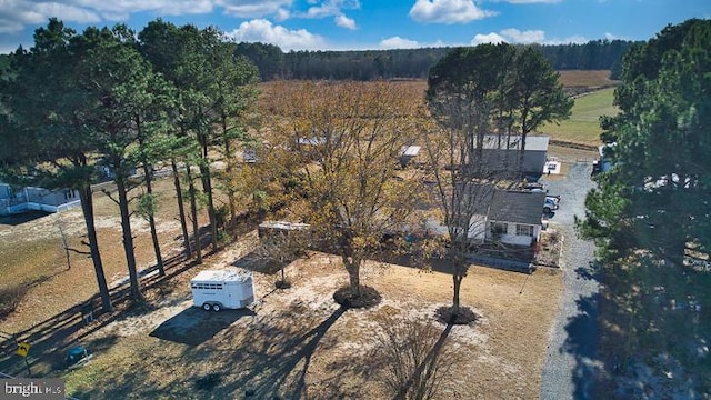 birds eye view of property with a rural view