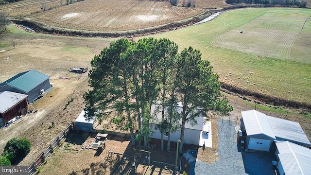 birds eye view of property featuring a rural view