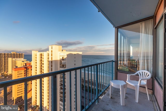 balcony at dusk with a water view