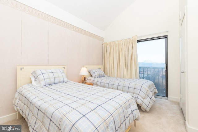 bedroom featuring access to outside, light colored carpet, and lofted ceiling