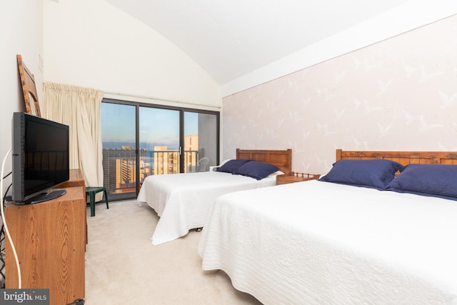 bedroom featuring light carpet, access to outside, and lofted ceiling