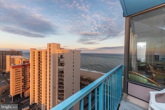 11000 Coastal Hwy Unit 2004, Ocean City, MD 21842 - balcony at dusk featuring a water view