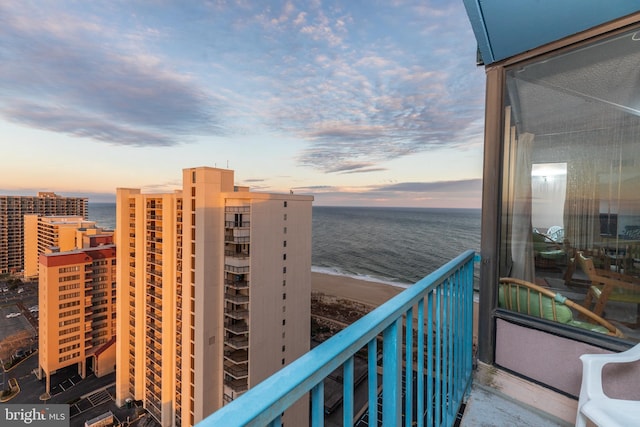 balcony at dusk with a water view