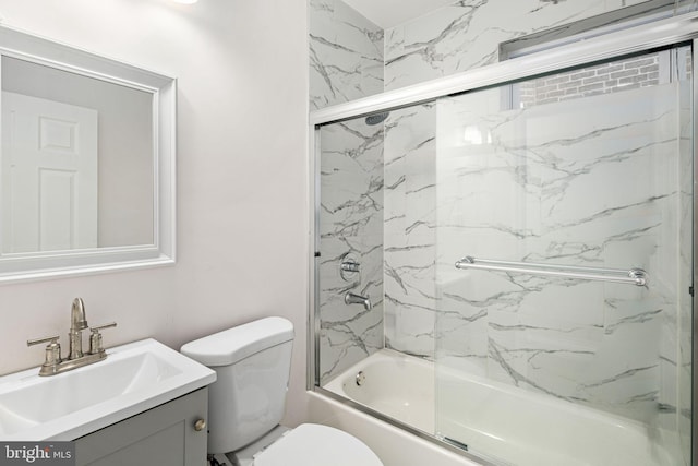5907 Osage Ave, Philadelphia, PA 19143 - bathroom with vanity, toilet, and bath / shower combo with glass door
