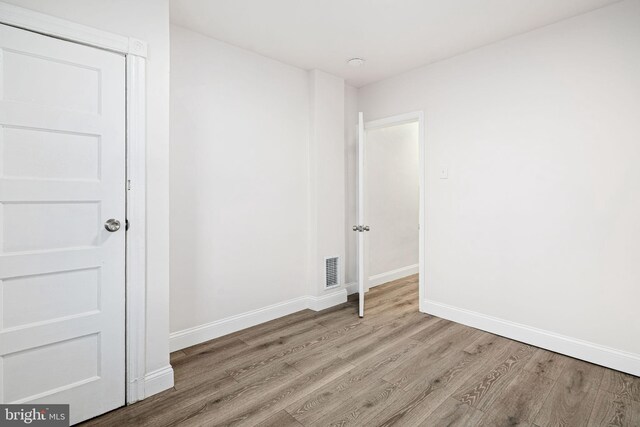 5907 Osage Ave, Philadelphia, PA 19143 - empty room featuring wood finished floors and baseboards