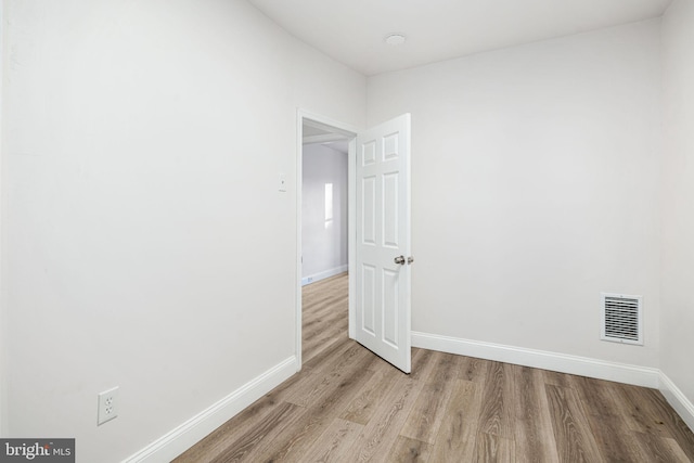5907 Osage Ave, Philadelphia, PA 19143 - unfurnished room featuring light wood-style floors, baseboards, and a smoke detector