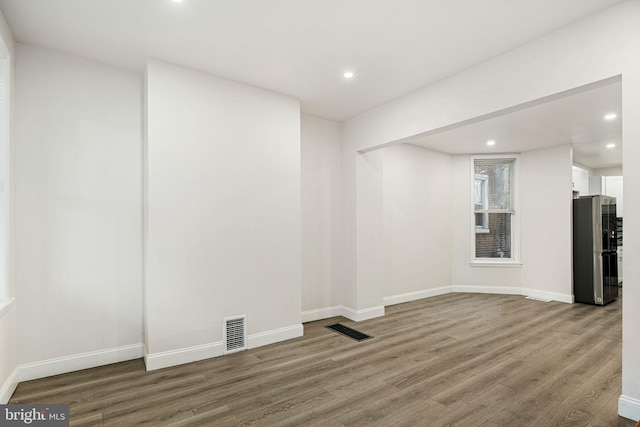 5907 Osage Ave, Philadelphia, PA 19143 - spare room with wood finished floors, recessed lighting, and baseboards