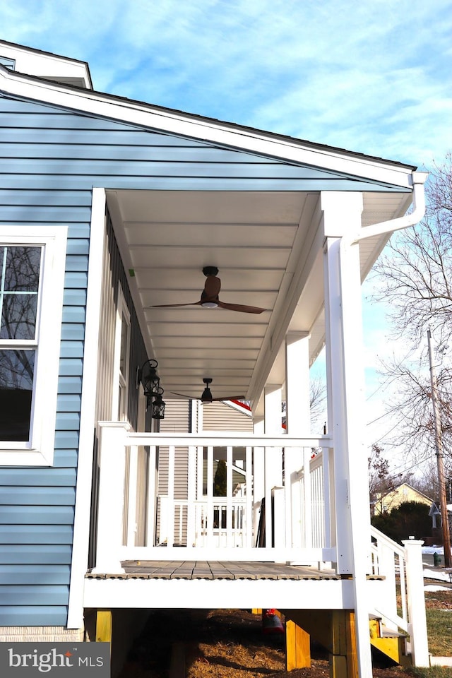 wooden deck with ceiling fan