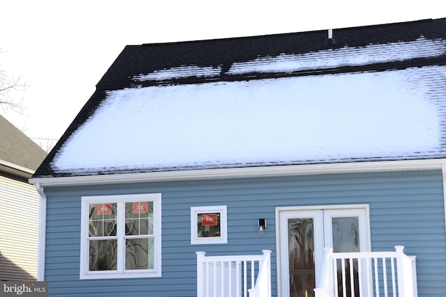 view of snow covered property