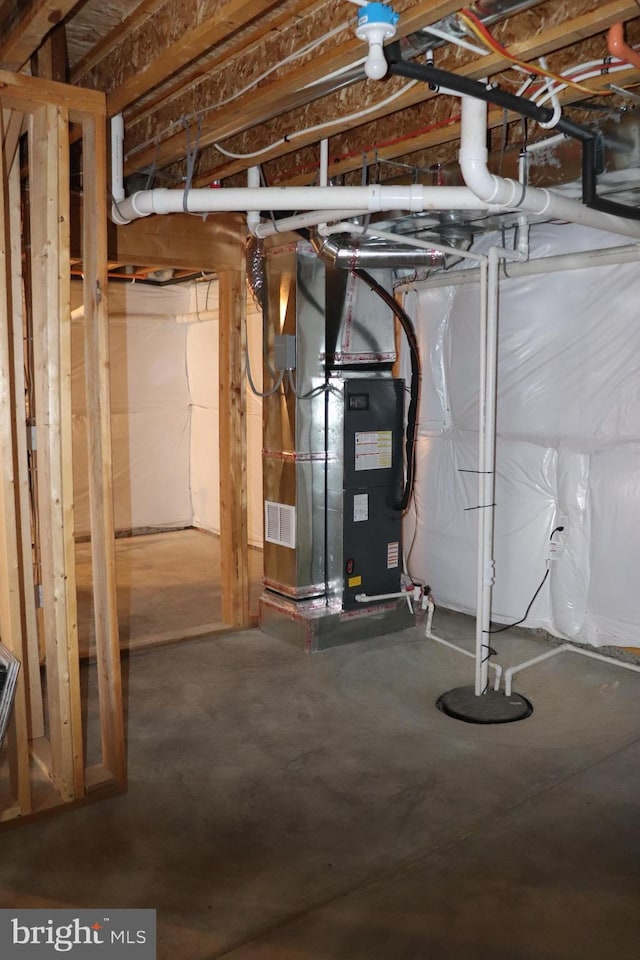 basement featuring heating unit