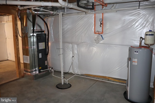 utility room featuring heating unit and water heater