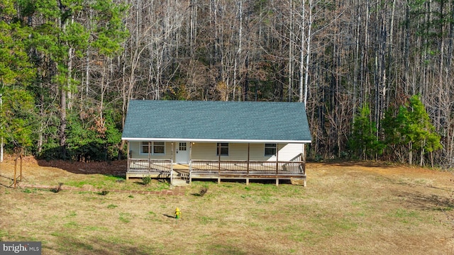 view of outbuilding featuring a lawn