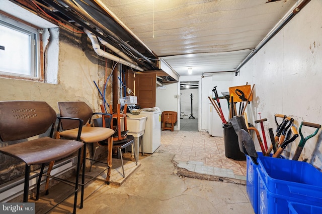 basement with separate washer and dryer