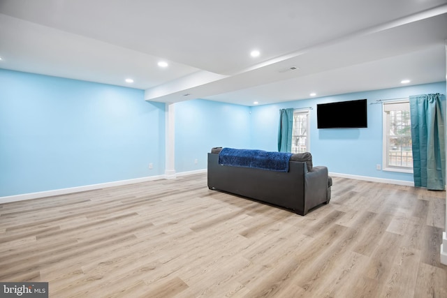 living room with light hardwood / wood-style floors