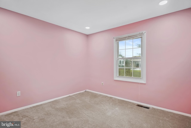 view of carpeted spare room