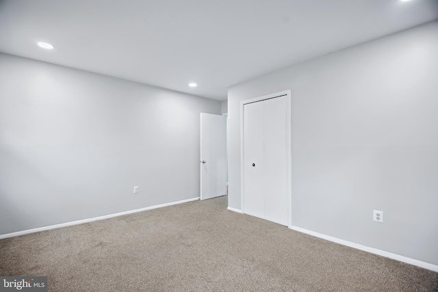 view of carpeted spare room