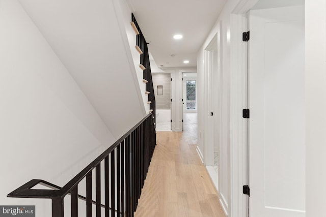 hall with light hardwood / wood-style flooring