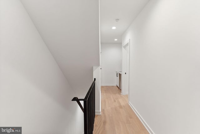 hallway featuring light hardwood / wood-style flooring