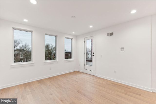 empty room featuring light hardwood / wood-style floors