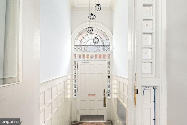 interior space with crown molding