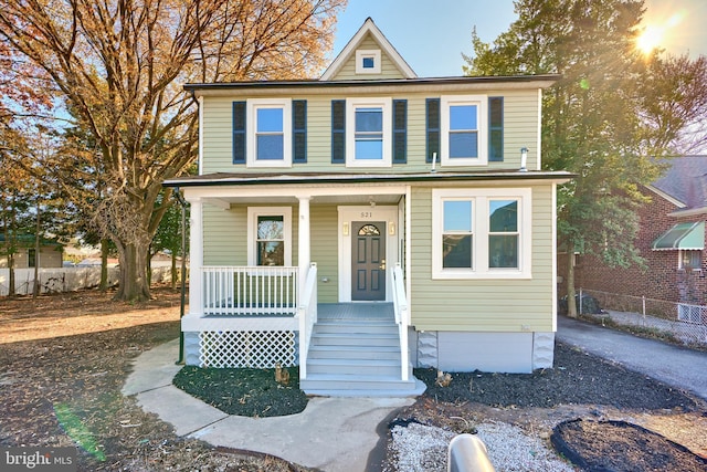 view of front of property featuring covered porch