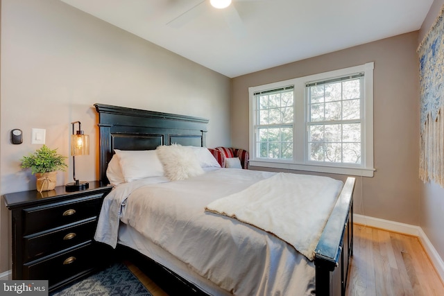 bedroom featuring ceiling fan and light wood-type flooring