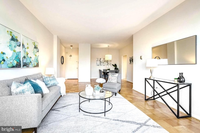 living room with light parquet floors