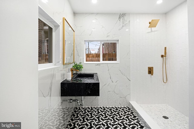 bathroom with tiled shower